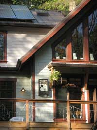 Front of the house showing exterior light donated by Kathy's co-workers with the National Park Service